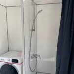 douchehoek + wasmachine mobiele badkamer