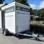 Buitenkant mobiele badkamer + was-droogcombinatie